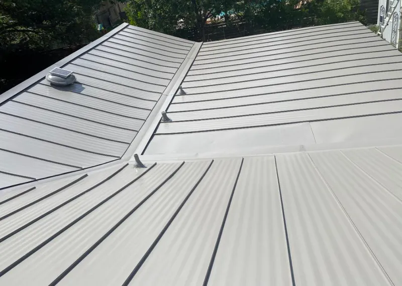 Solar attic fan installed on a metal roof for Roof Ventilation in Orcutt